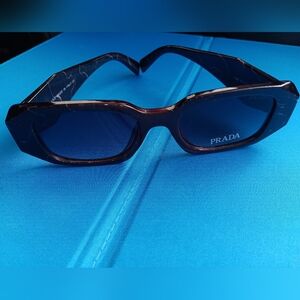 PRADA Unisex Sunglasses: Black Lenses And Brown/Marble Muti Color Frame